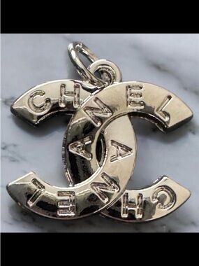 CHANEL CC Logo Charm Pendant – Gold Tone Interlocking CC w/ CHANEL Lettering